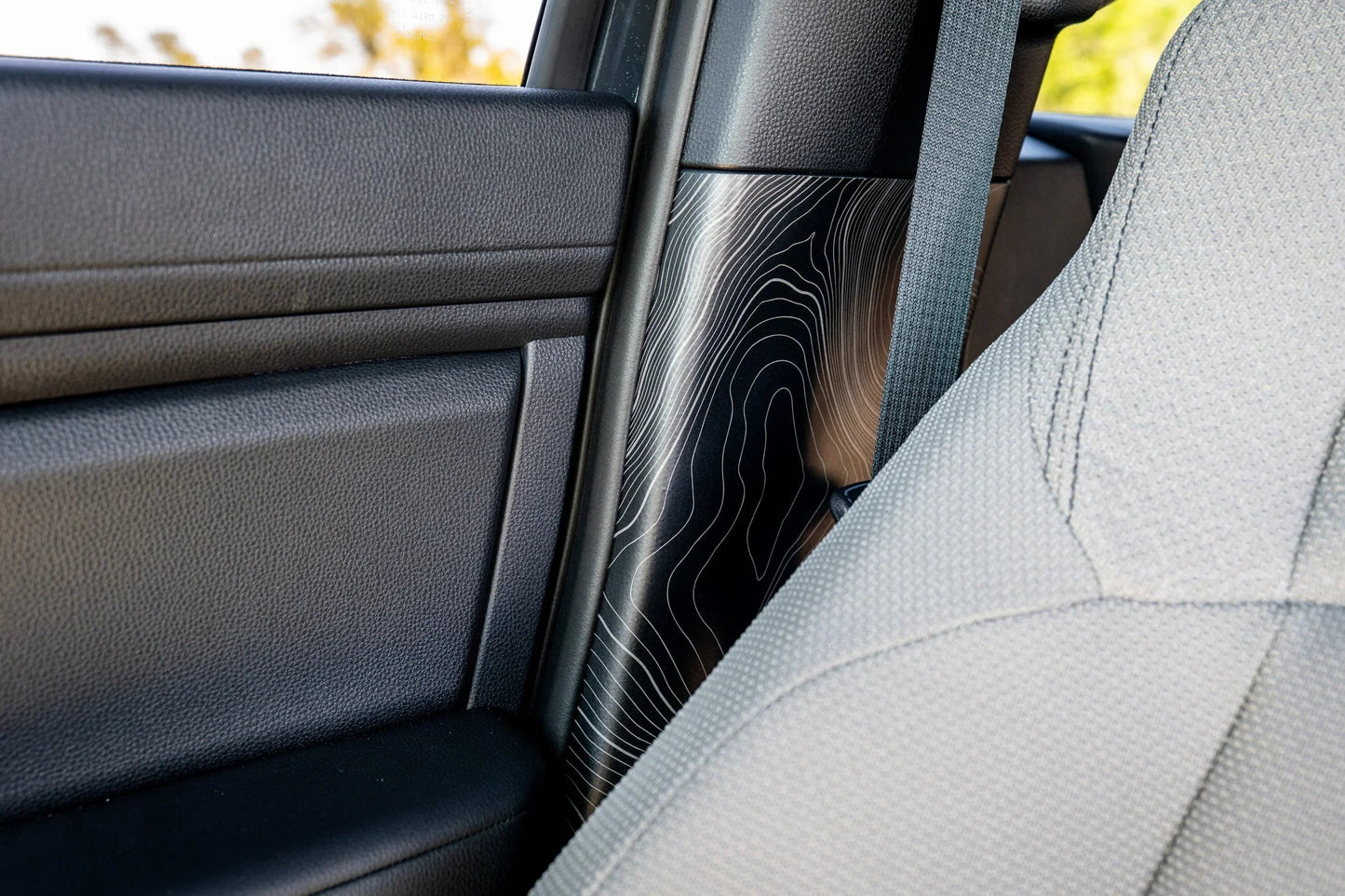 Topographic Seatbelt Panel Protection - 2024+ Tacoma / 2025+ 4Runner